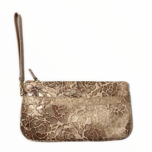 Tusk gold metallic embossed floral clutch wristlet